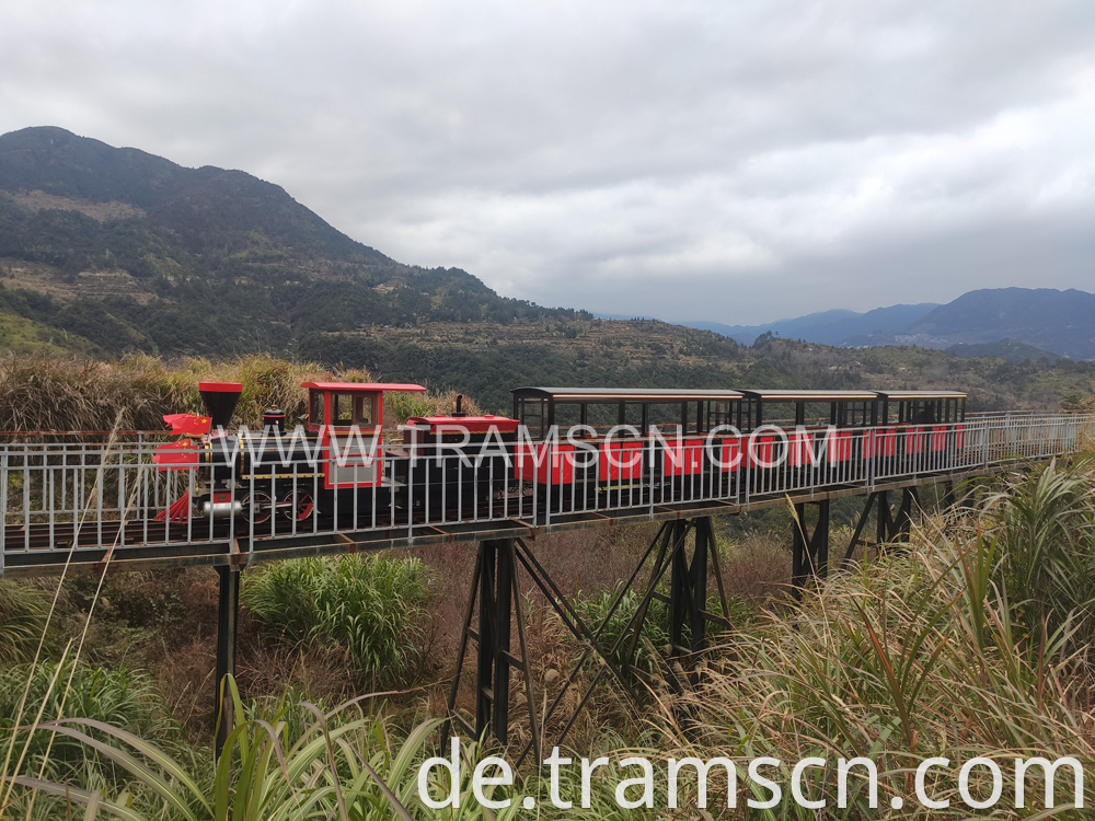 sightseeing train on hill bridge at autumn